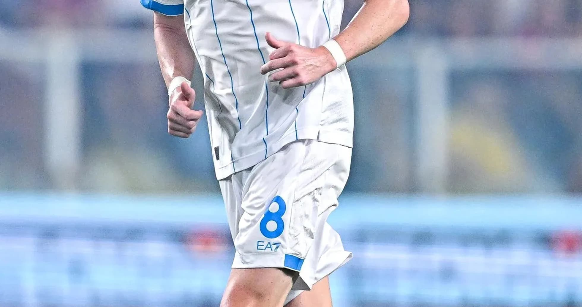 Player wearing Napoli kit during match action