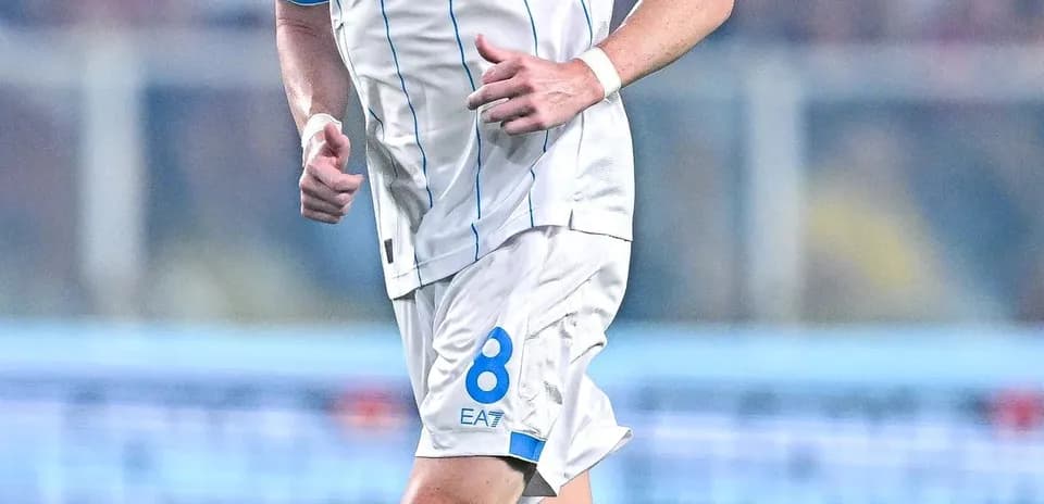 Player wearing Napoli kit during match action