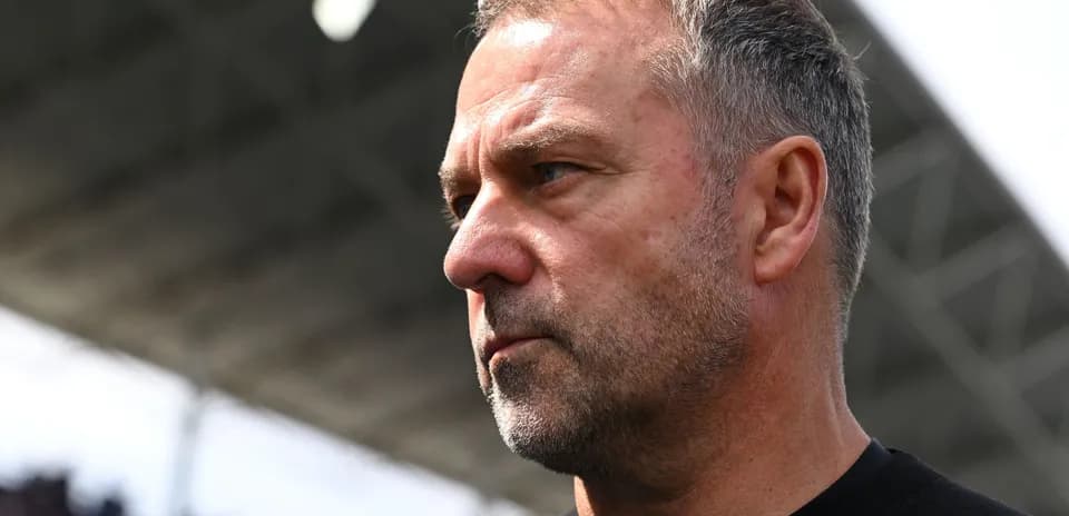 Close-up of a football manager on the sidelines