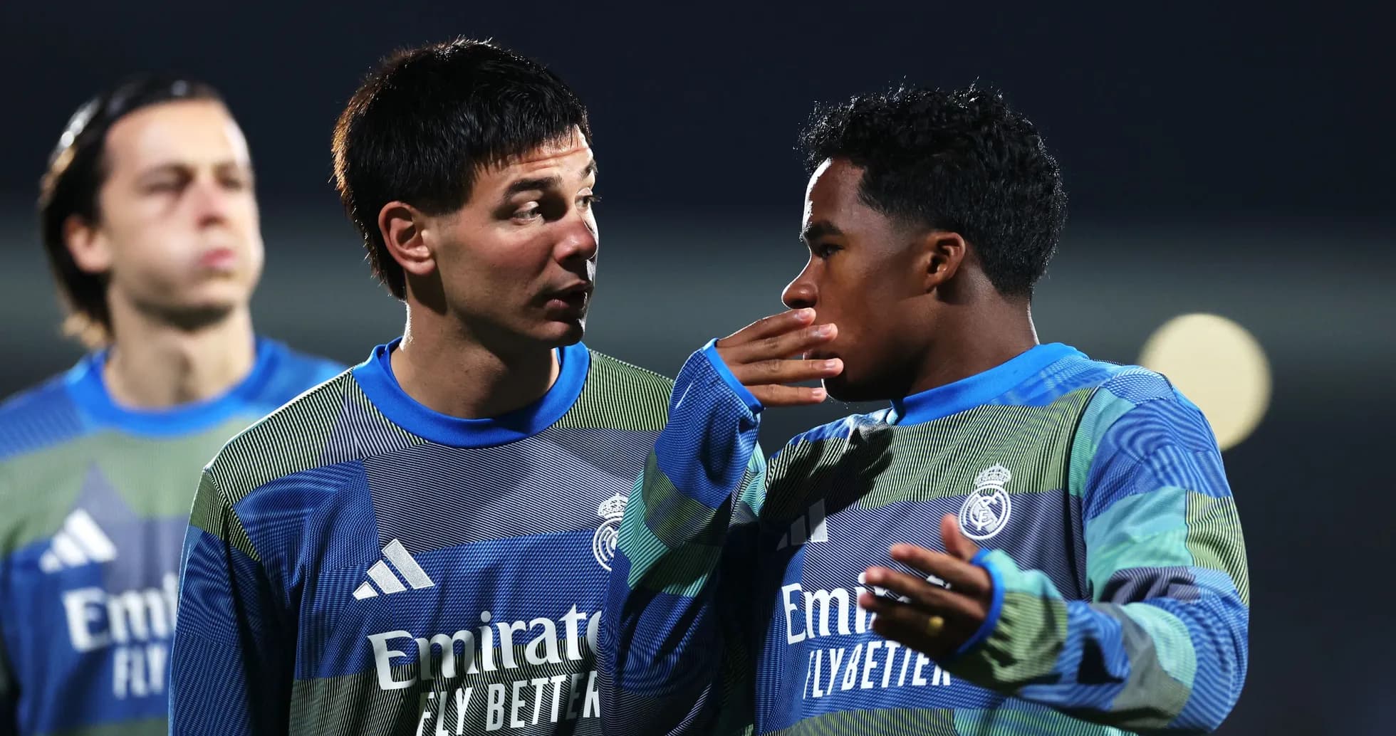 Two players discussing during Real Madrid training session