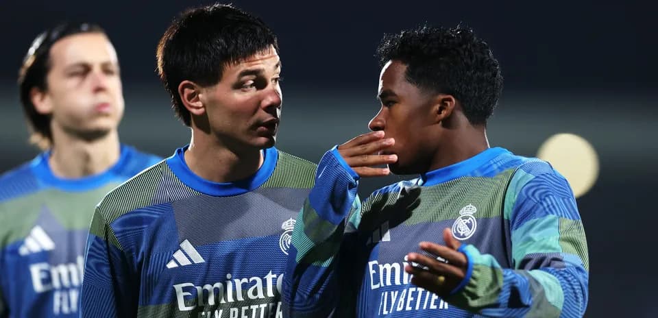 Two players discussing during Real Madrid training session