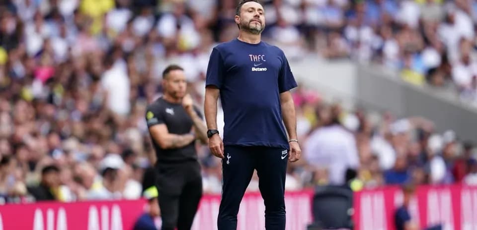 Manager observing the match from the sidelines