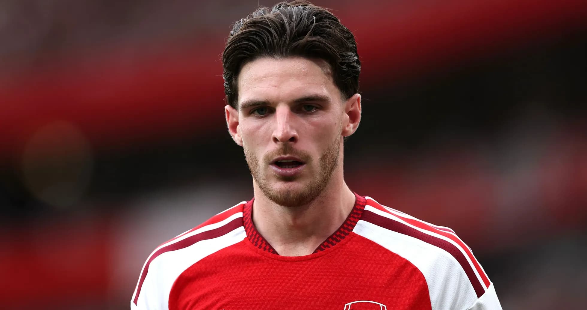 Player wearing Arsenal kit on the pitch