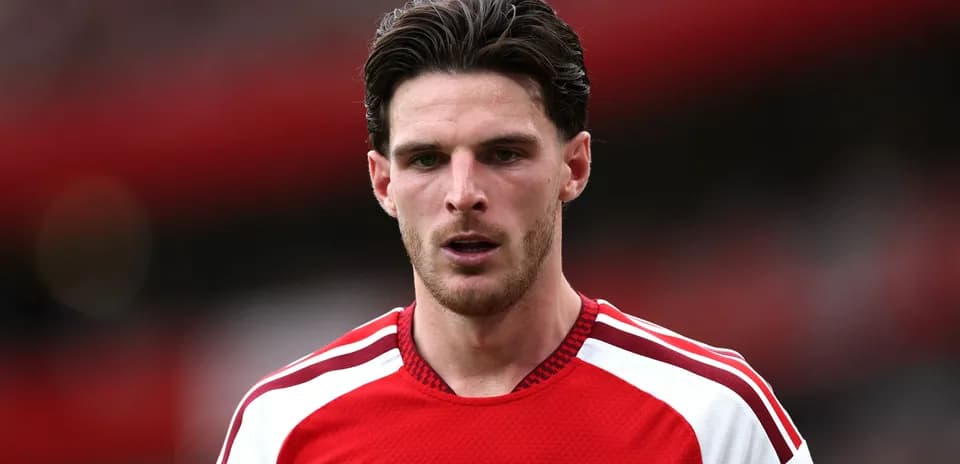 Player wearing Arsenal kit on the pitch
