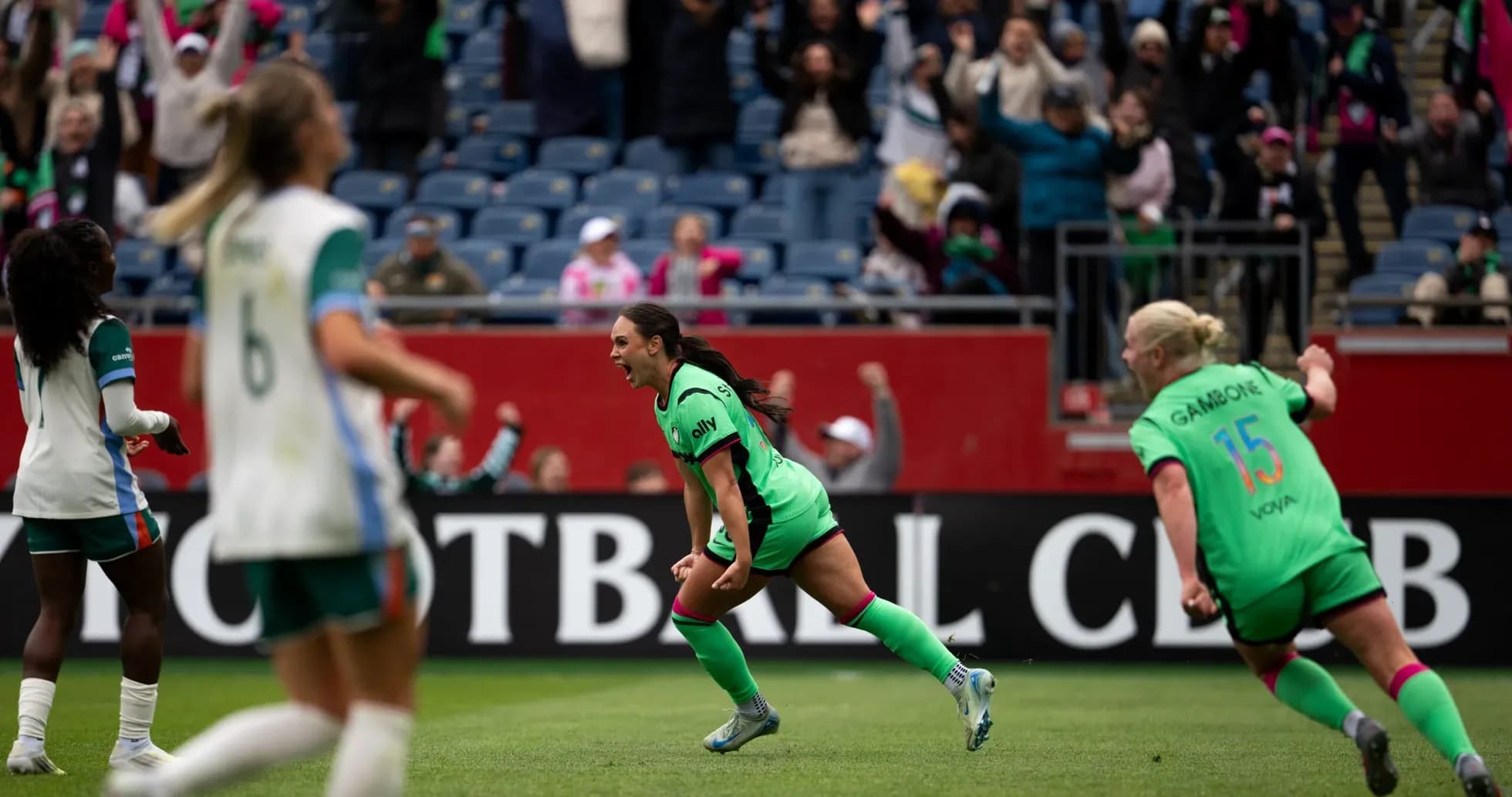 Player celebrating a goal during NWSL match