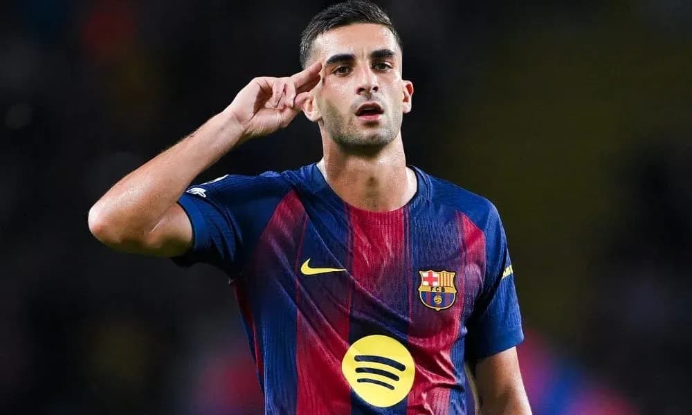 Player saluting during match in FC Barcelona jersey