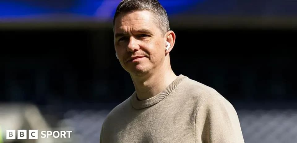 Person wearing earphones at sports venue