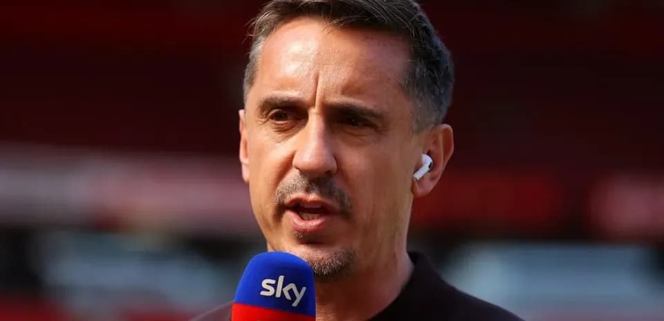 Sports commentator speaking into microphone on set