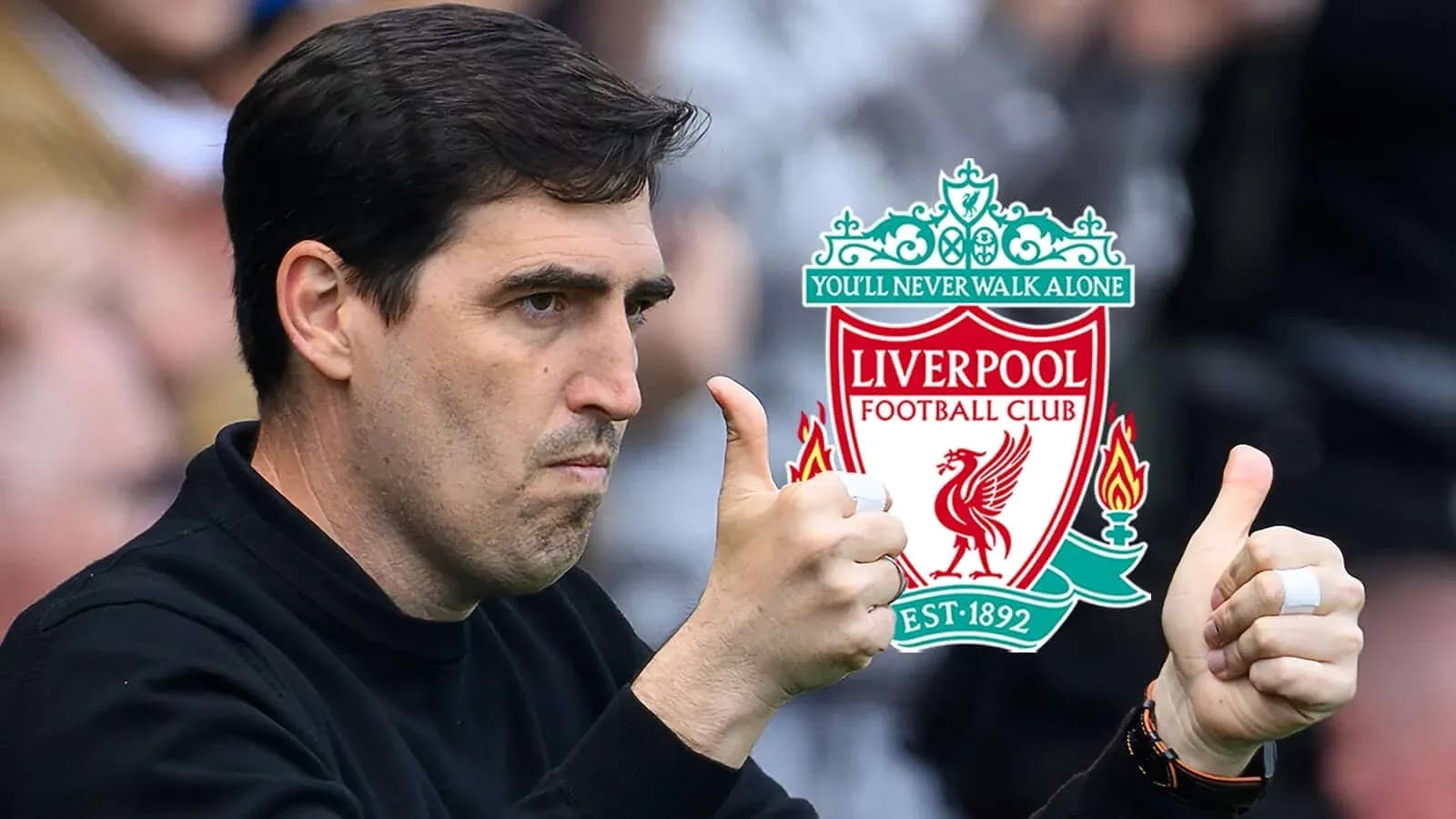 Coach giving thumbs up with Liverpool logo