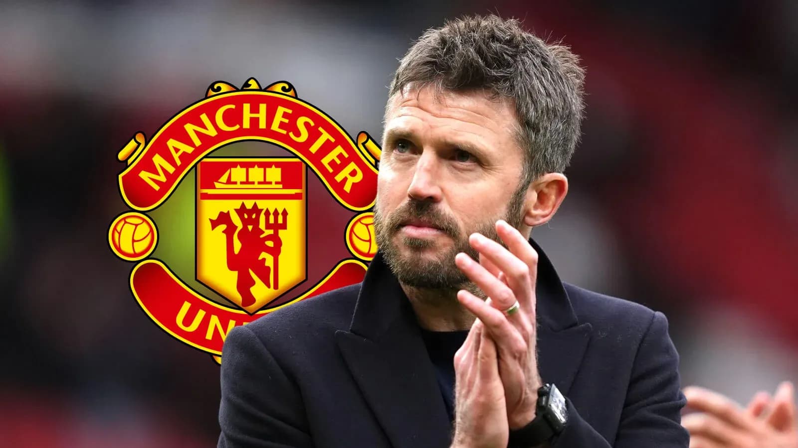 Man clapping in front of Manchester United logo