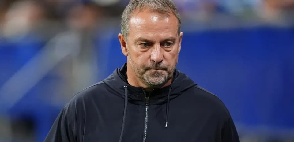 Coach walking on the sidelines during a match