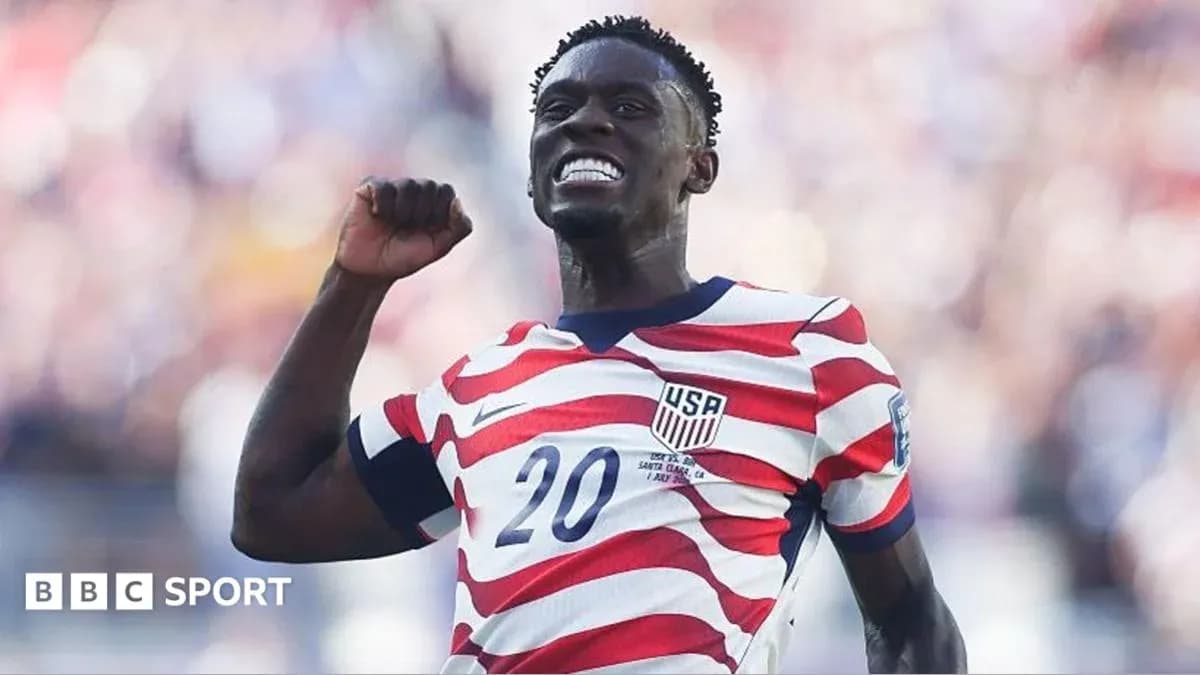 Player celebrating a goal in USA jersey