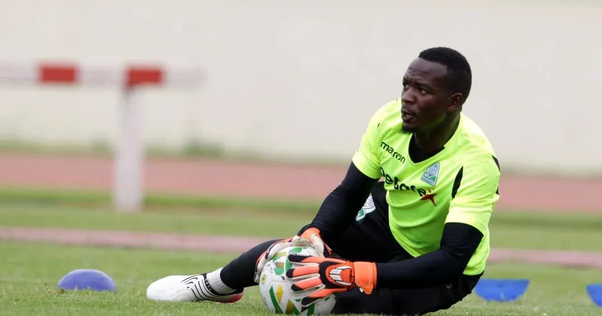 Goalkeeper training on the field with ball