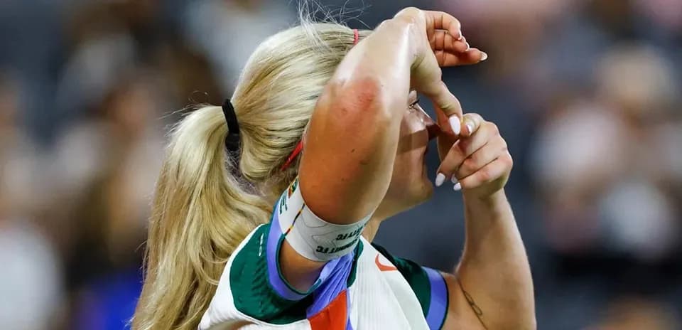 Athlete adjusting headband during a match