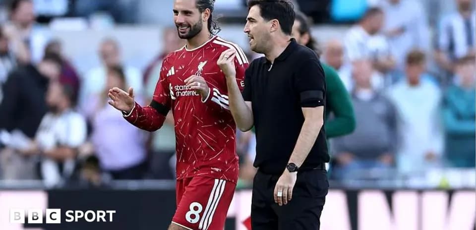Player and coach discussing during a match