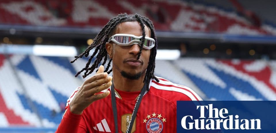 Player gesturing while wearing sunglasses at stadium