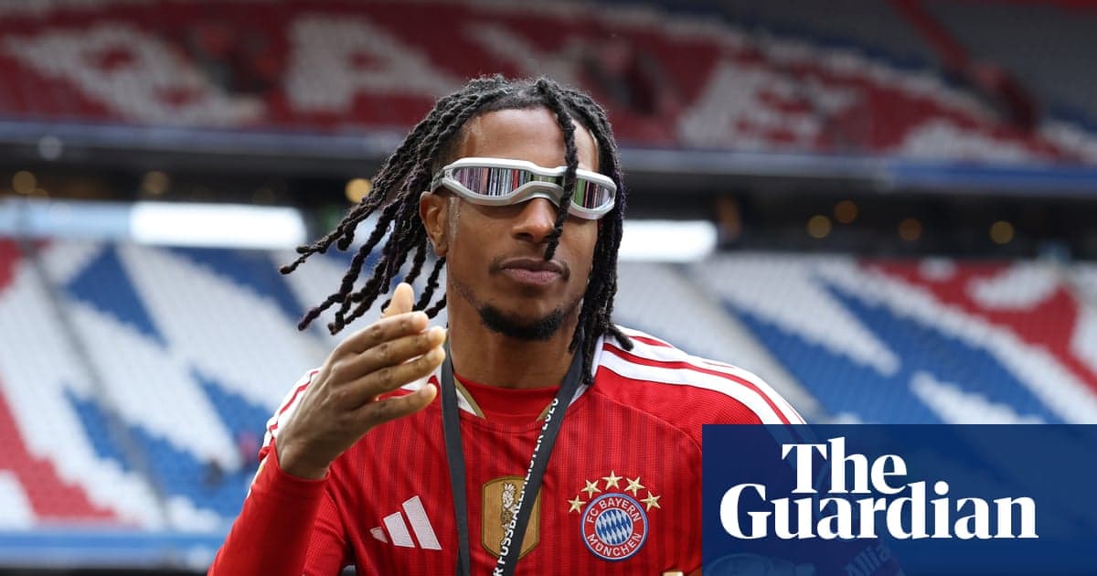 Player gesturing while wearing sunglasses at stadium