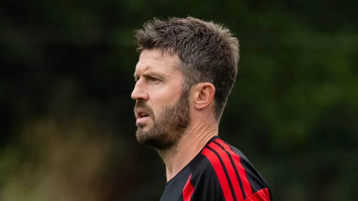 Coach observing during training session outdoors