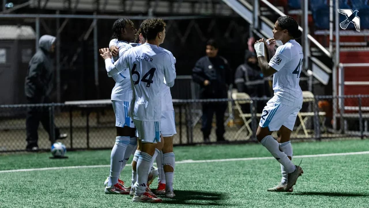 Players celebrating a goal during MLS Next Pro match