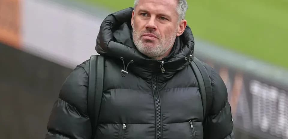 Man wearing a black puffer jacket walking