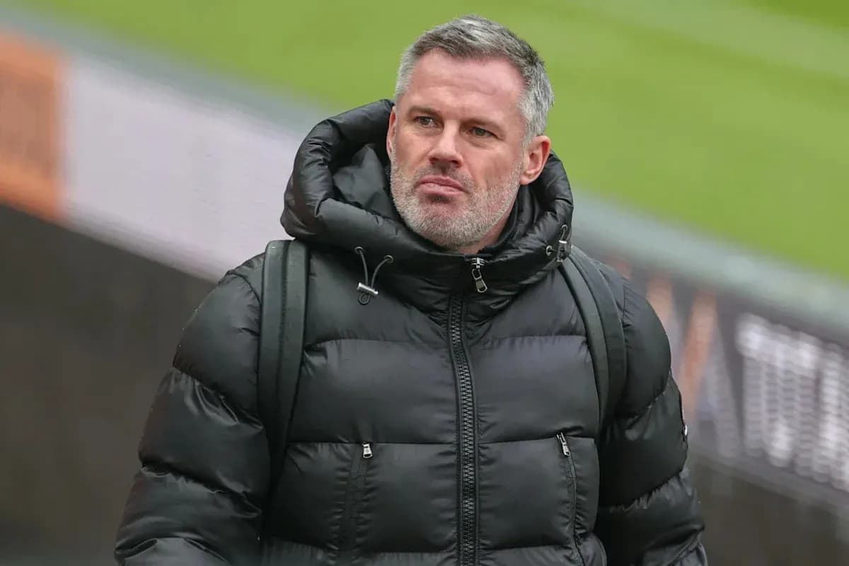 Man wearing a black puffer jacket walking