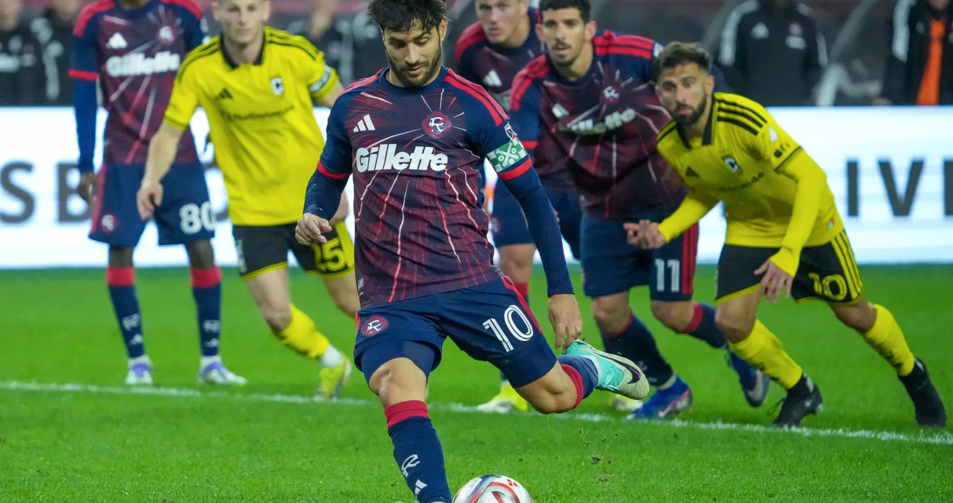Player taking a penalty kick during match