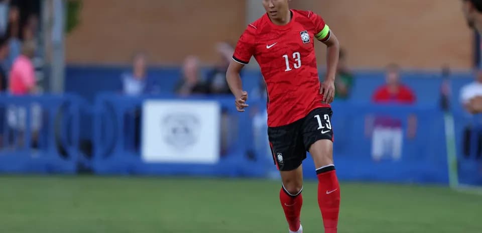 South Korea player dribbling during match