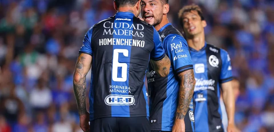 Players interacting during Liga MX match