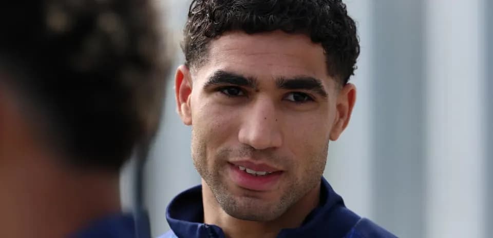 Football player speaking during training session
