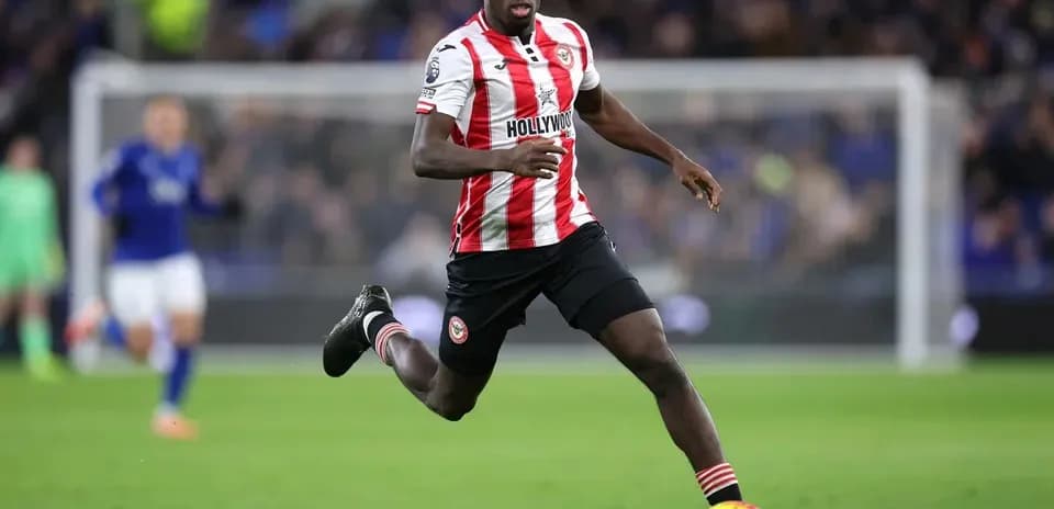 Player running with the ball during a match