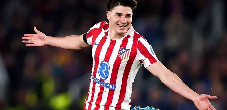 Atletico Madrid player celebrating a goal on pitch