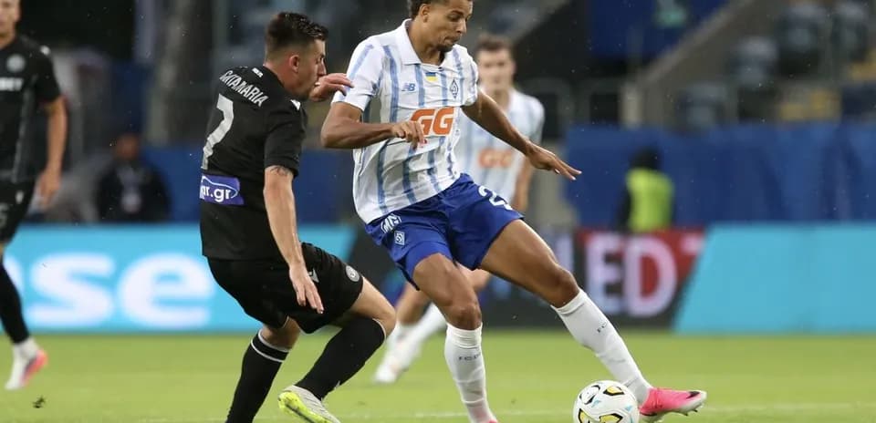 Two players competing during PAOK vs Dynamo Kyiv