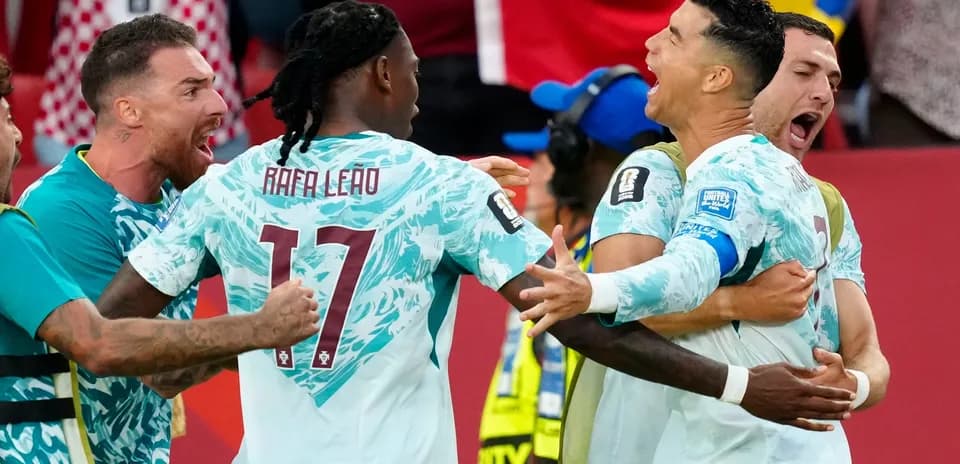 Portugal players celebrating a goal against Croatia