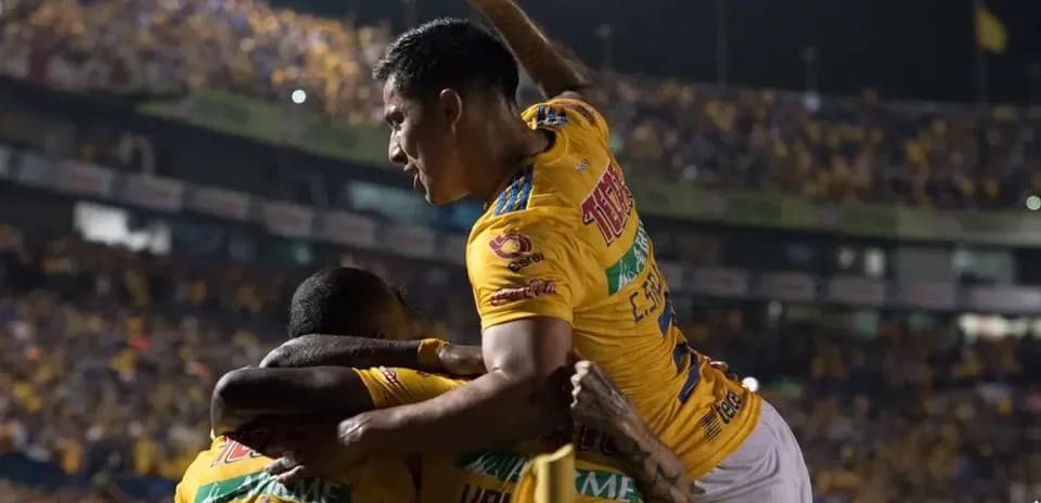 Tigres UANL players celebrating a goal