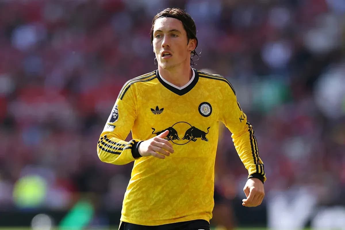 Player in yellow jersey running on the field