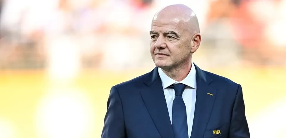 FIFA president walking on the pitch during event