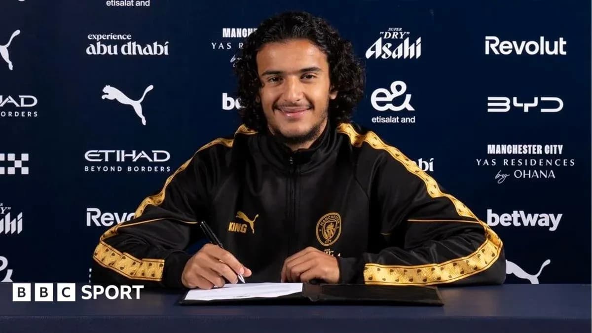 Player signing contract at Manchester City announcement
