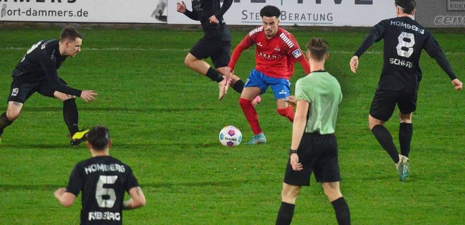 Players in action during Holzheimer SG vs Schonnebeck match
