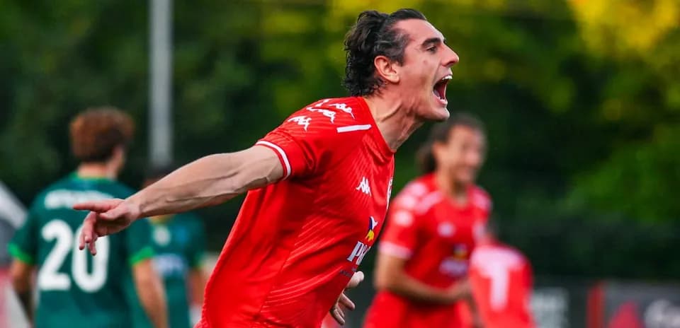 Player celebrating a goal during football match
