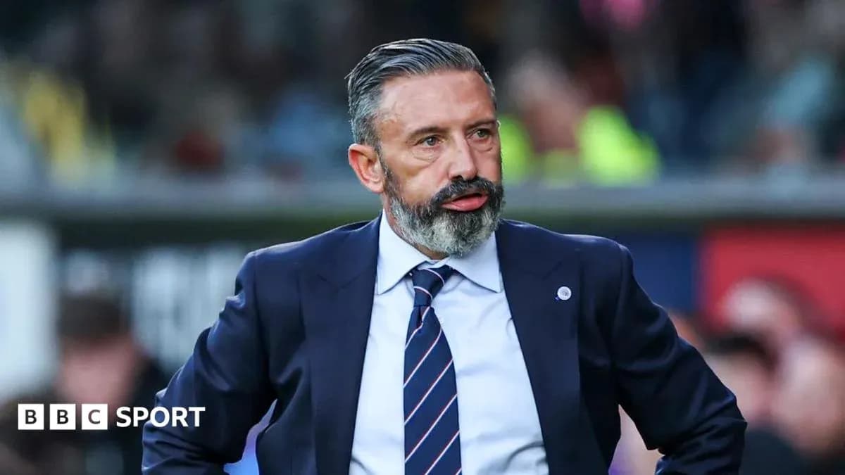 Football manager observing the match from sidelines