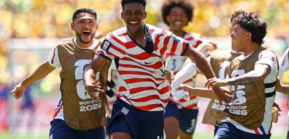 US players celebrating a goal during World Cup match