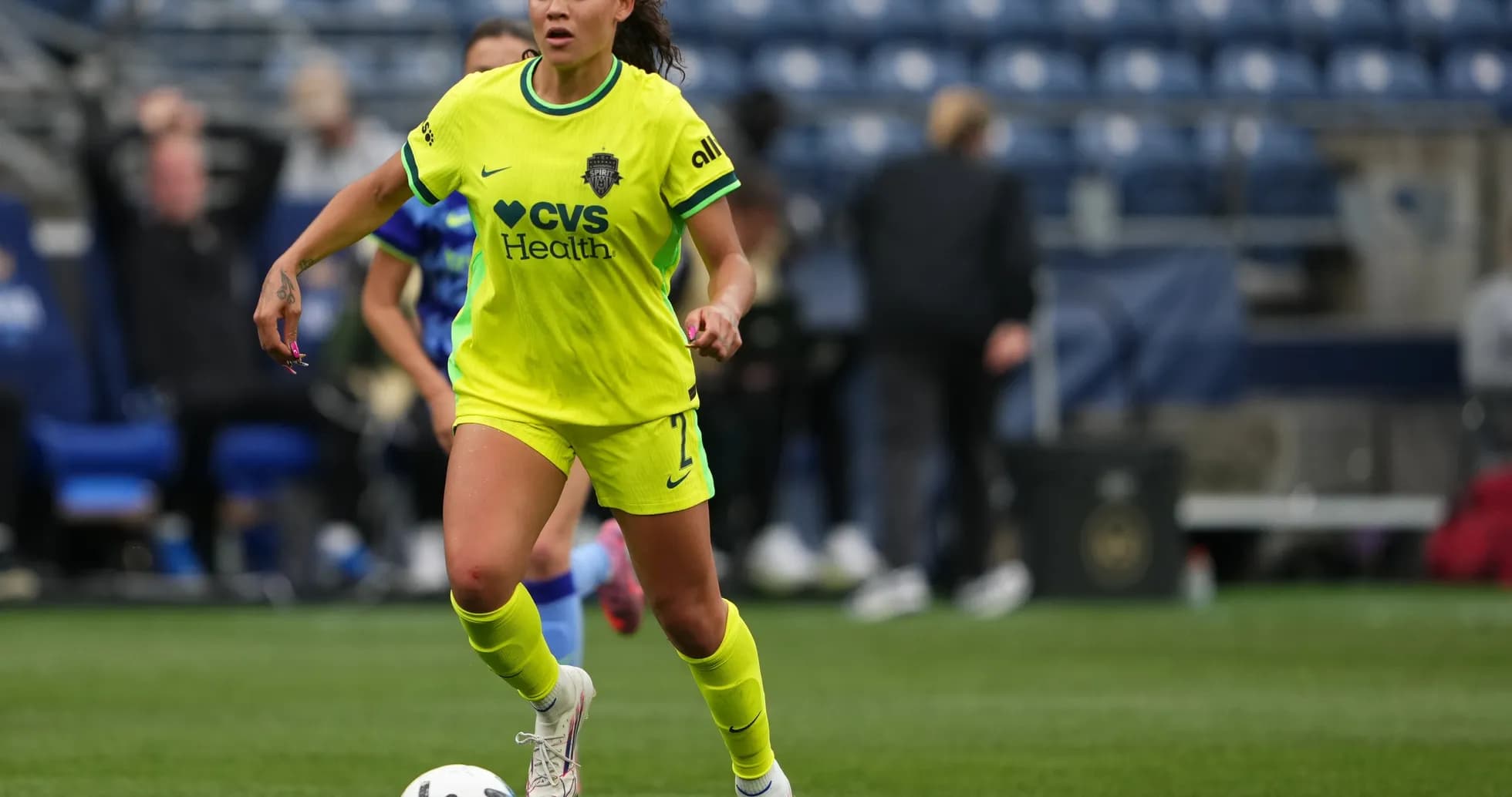 Player dribbling the ball during NWSL match