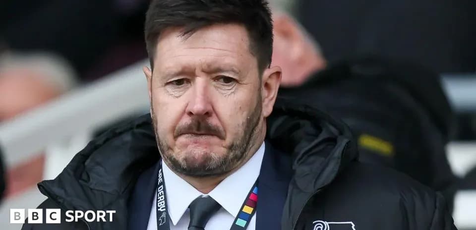 Manager looking on from the sidelines during match