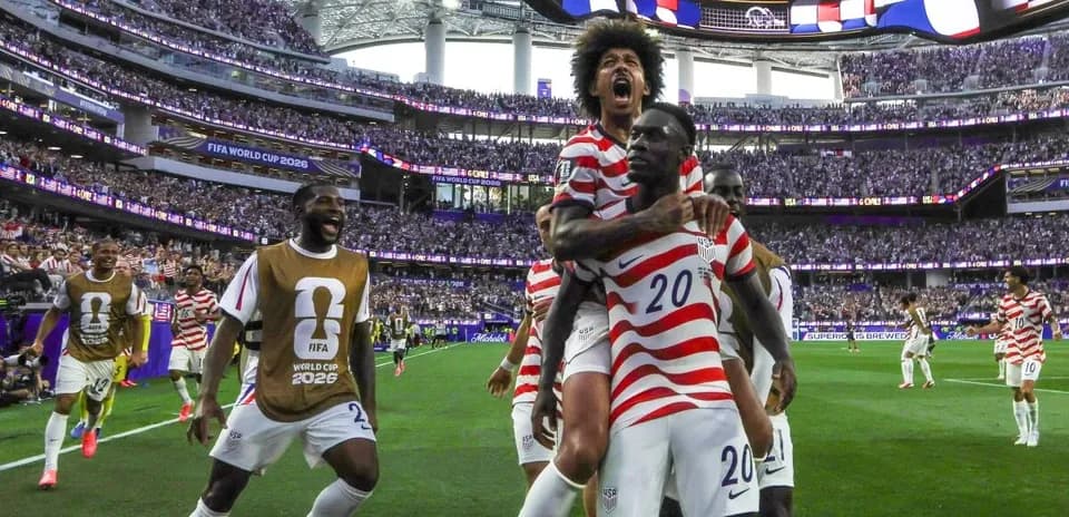USA players celebrating a goal during World Cup match