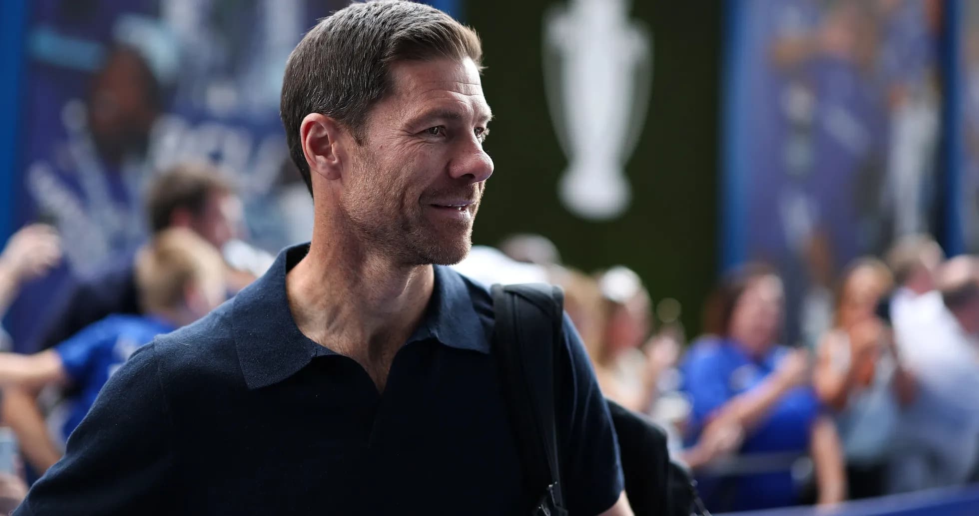 Man with a backpack at a sports event