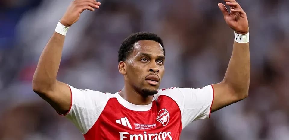 Arsenal player gesturing during match action