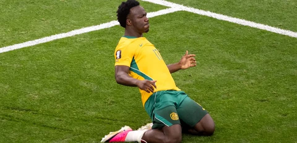 Player celebrating after scoring a goal during match
