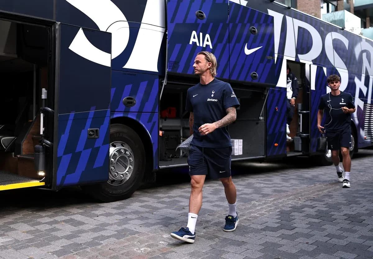 Tottenham players exiting team bus before match