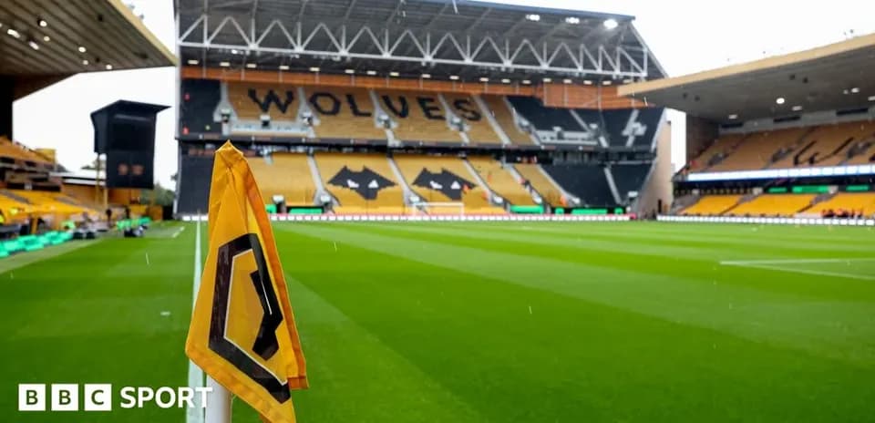 Corner flag in front of empty stadium seats