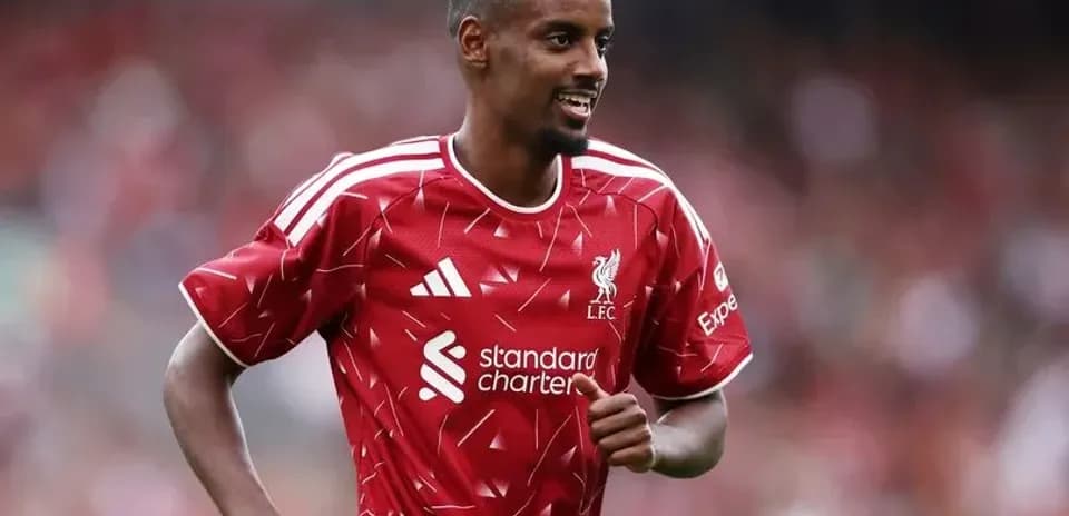 Player celebrating during Liverpool match at stadium
